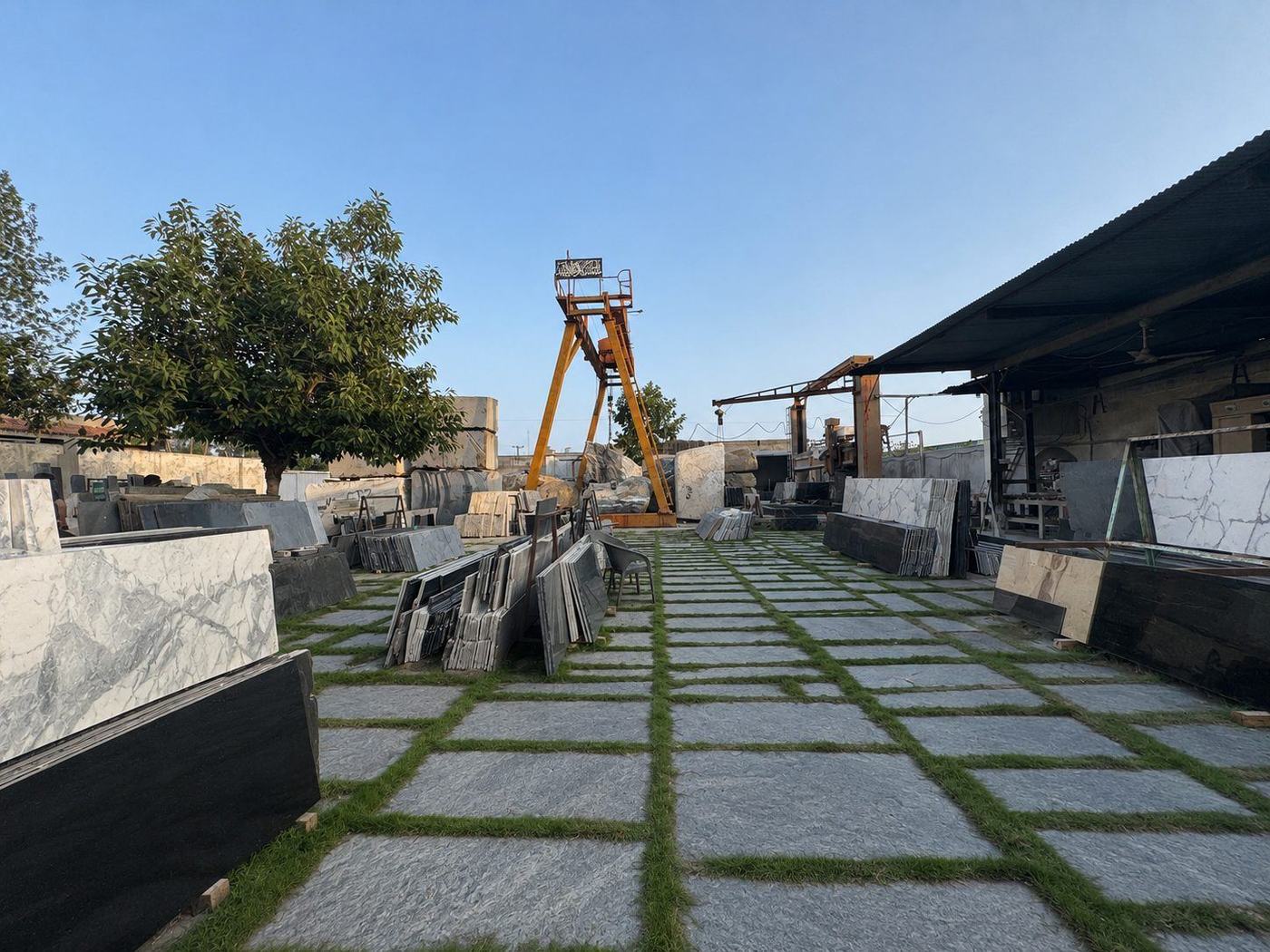Finished marble and granite slabs stocked in the open yard